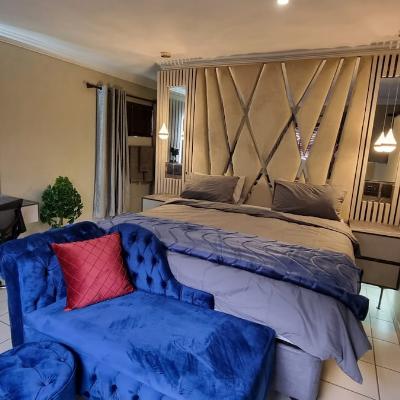 King sized bed with usb charging ports on side tables.