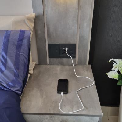 USB ports on all bed side tables for charging