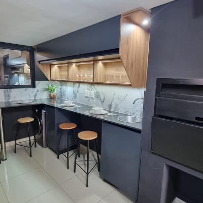 Indoor BBQ/Braai grill and kitchen and bar seating area.