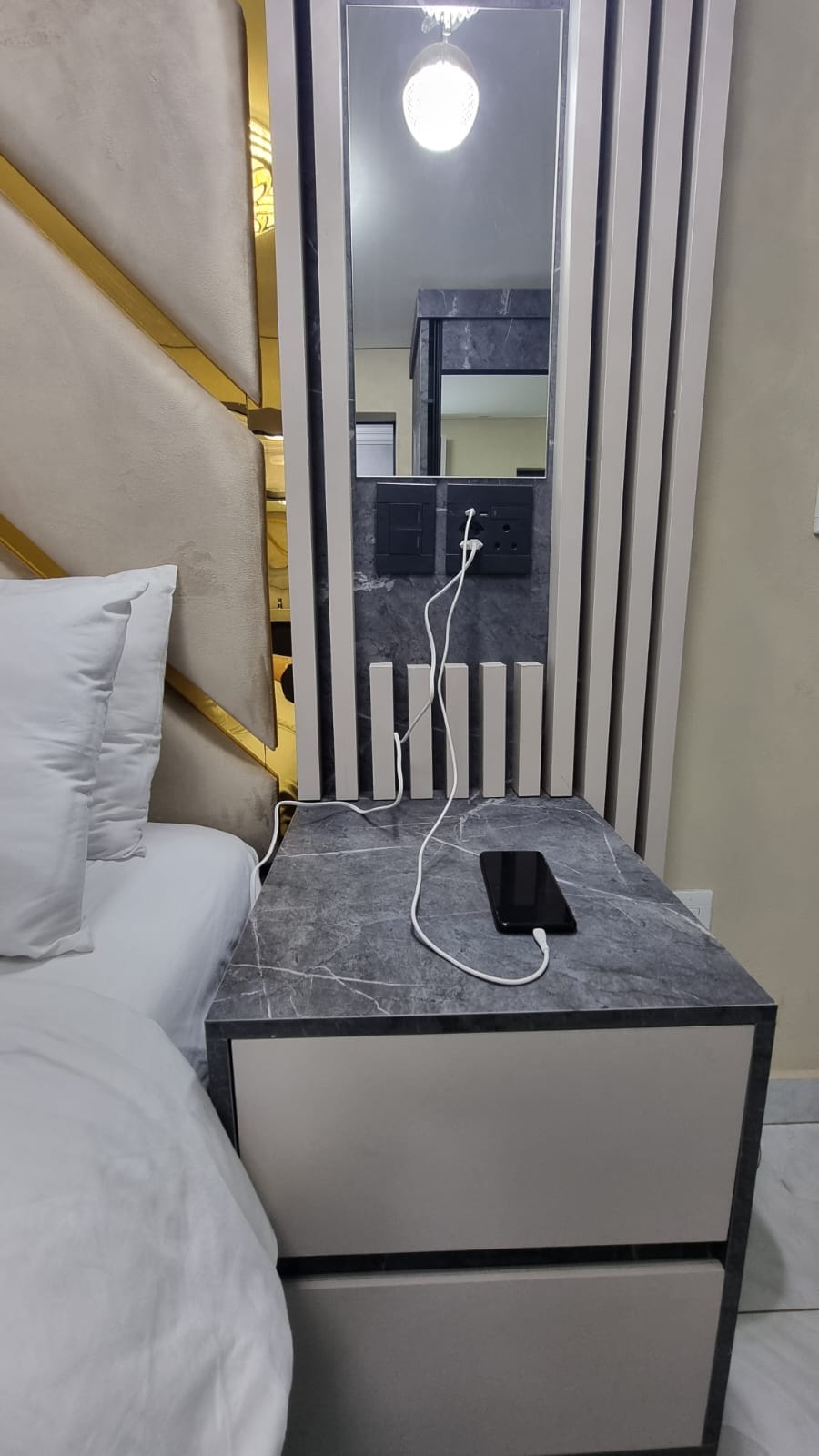 Bed side plugs and USB charge ports.