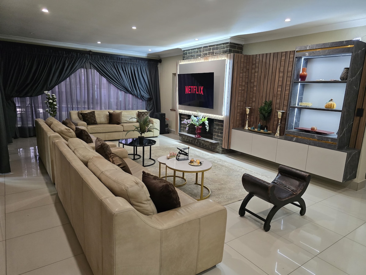 Large living room with smart TV with netflix subscription
