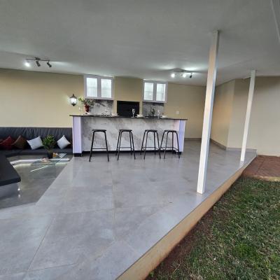 Outdoor kitchen, dining area with BBQ grill