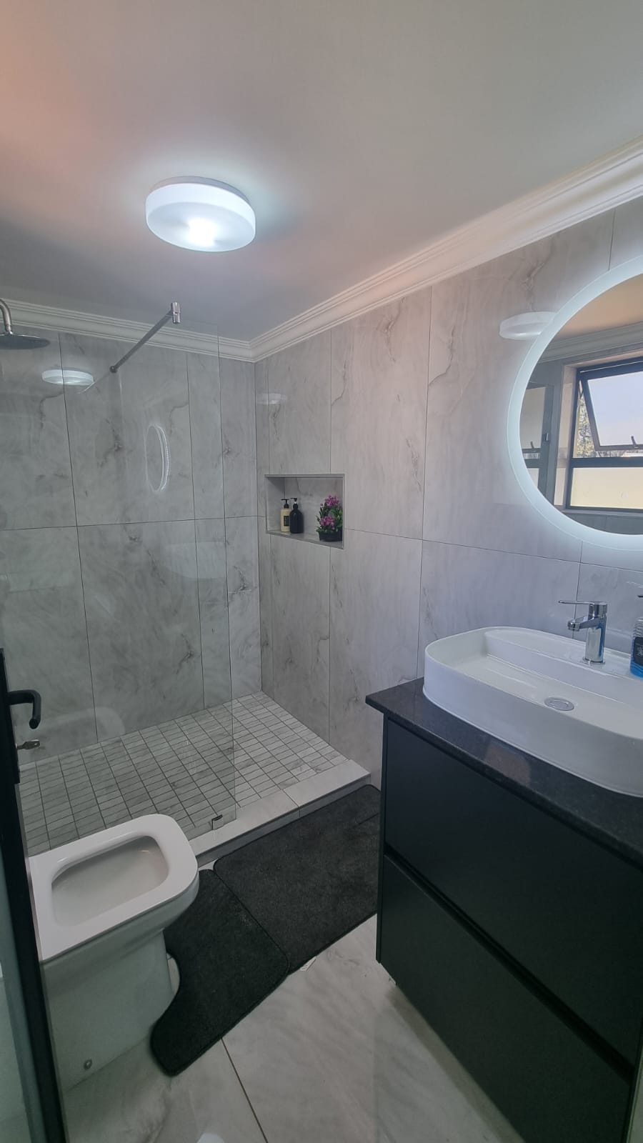 Ensuite bathroom with shower