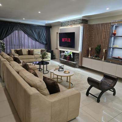 Large living room with smart TV with netflix subscription