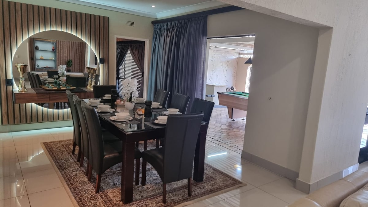 8 seater dining table over looking the entertainment area