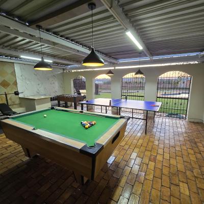 Large entertainment area will pool table, table tennis, foosball, and gym area with weights, cycle and treadmill.