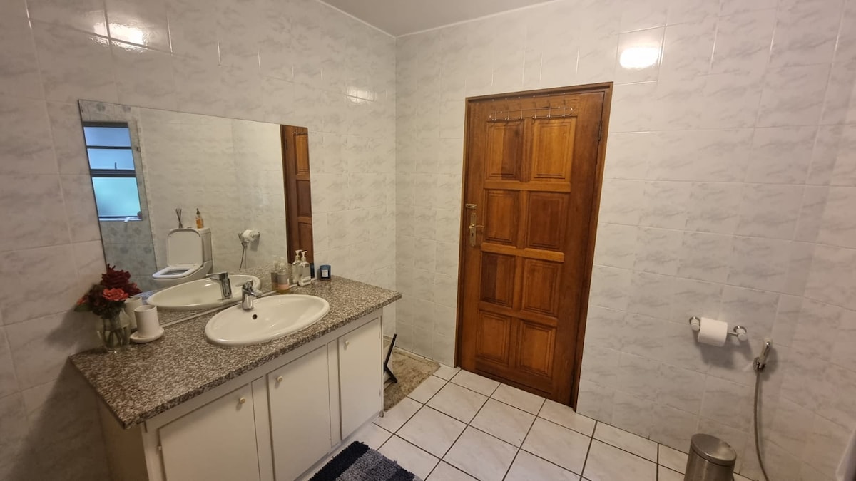 Master bedroom bathroom with a shower