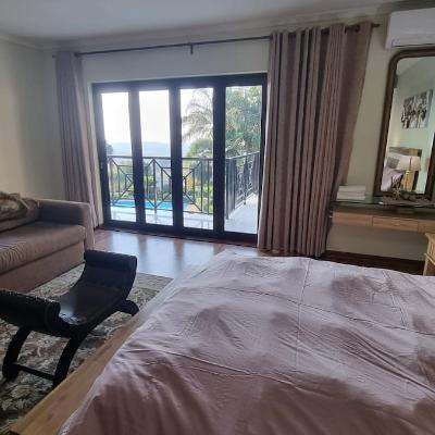 Queen sized bed with electric blanket and panoramic views.