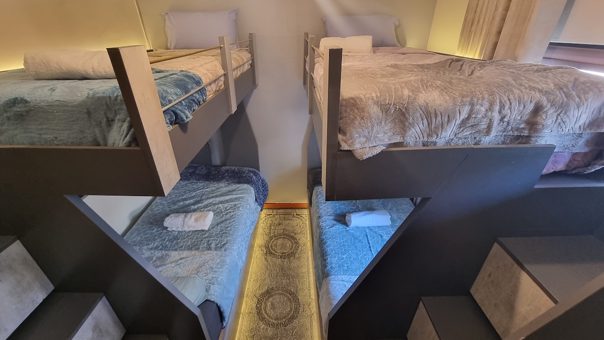 Four single bunk beds with LED lights. Beds has USB ports to charge devices. Beds have electric blankets to keep warm on cold nights.