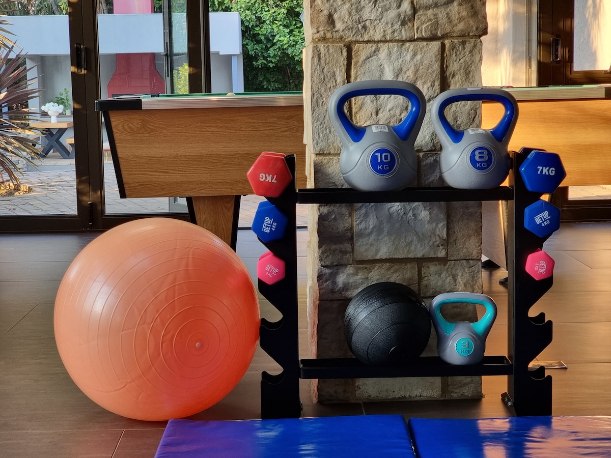 Basic dumbbells, kettlebells, balls and matts for working out