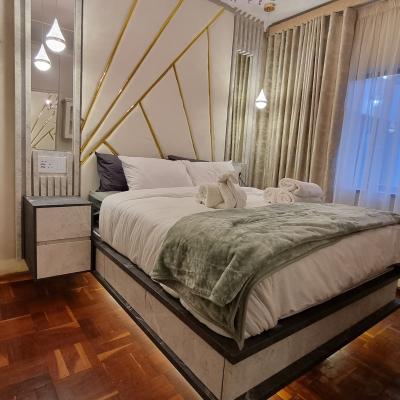 A queen sized LED lit floating bed with nights stands that have USB ports. Queen sized bed has an electric blanket to keep warm on cold nights.