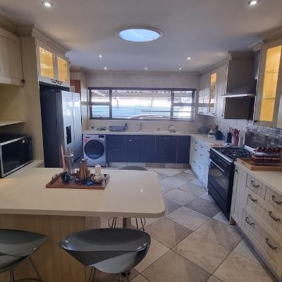 Fully stocked kitchen with gas stove and oven, double door fridge, microwave oven, kettle, toaster and washer/dryer combo washing machine. Power for fridge, stove and microwave oven is fed from solar powered battery inverter.