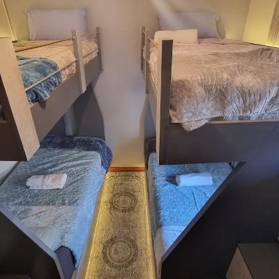 Four single bunk beds with LED lights. Beds has USB ports to charge devices. Beds have electric blankets to keep warm on cold nights.
