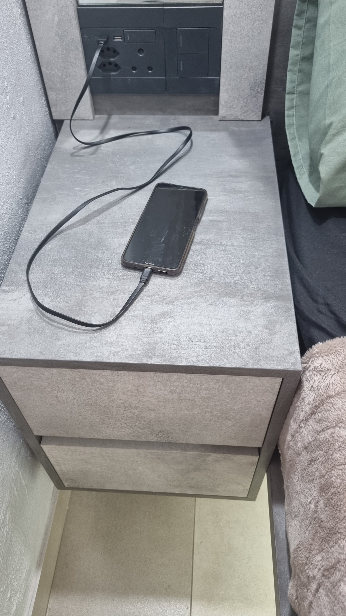 Apartment has plugs with USB ports to allow for device charging