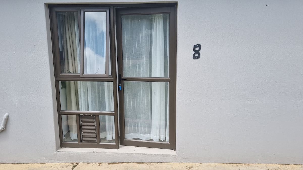 Entrance with cat flap.