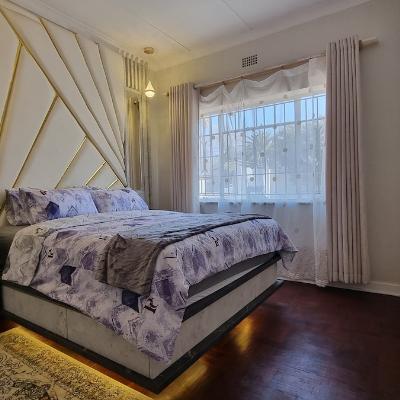 Floating LED light queen sized bed with USB side pedestals and electric blanket