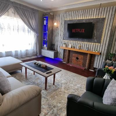 LED lit TV lounge with Smart TV with Netflix