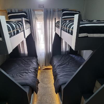 LED lit bunk beds, bottom are 3/4 size and top are single size beds with electric blankets and USB plugs